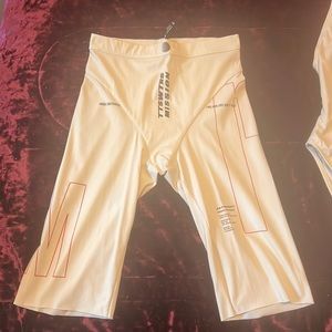 Body suit and cycle shorts .